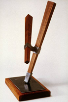 Jericho - walnut wood and steel base, base: 12” x 10” height: 24”